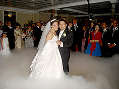 Bride and groom dancing on a cloud